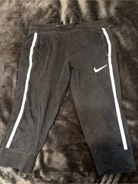 Nike Women’s Black Joggers with White Side Stripes